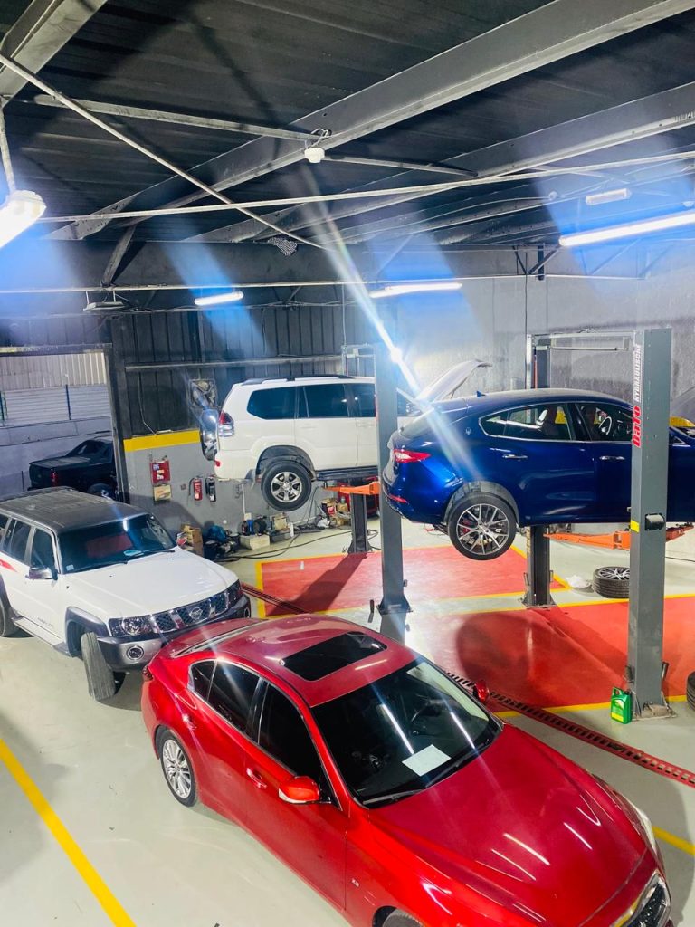SNS Auto car garage servicing premium vehicles